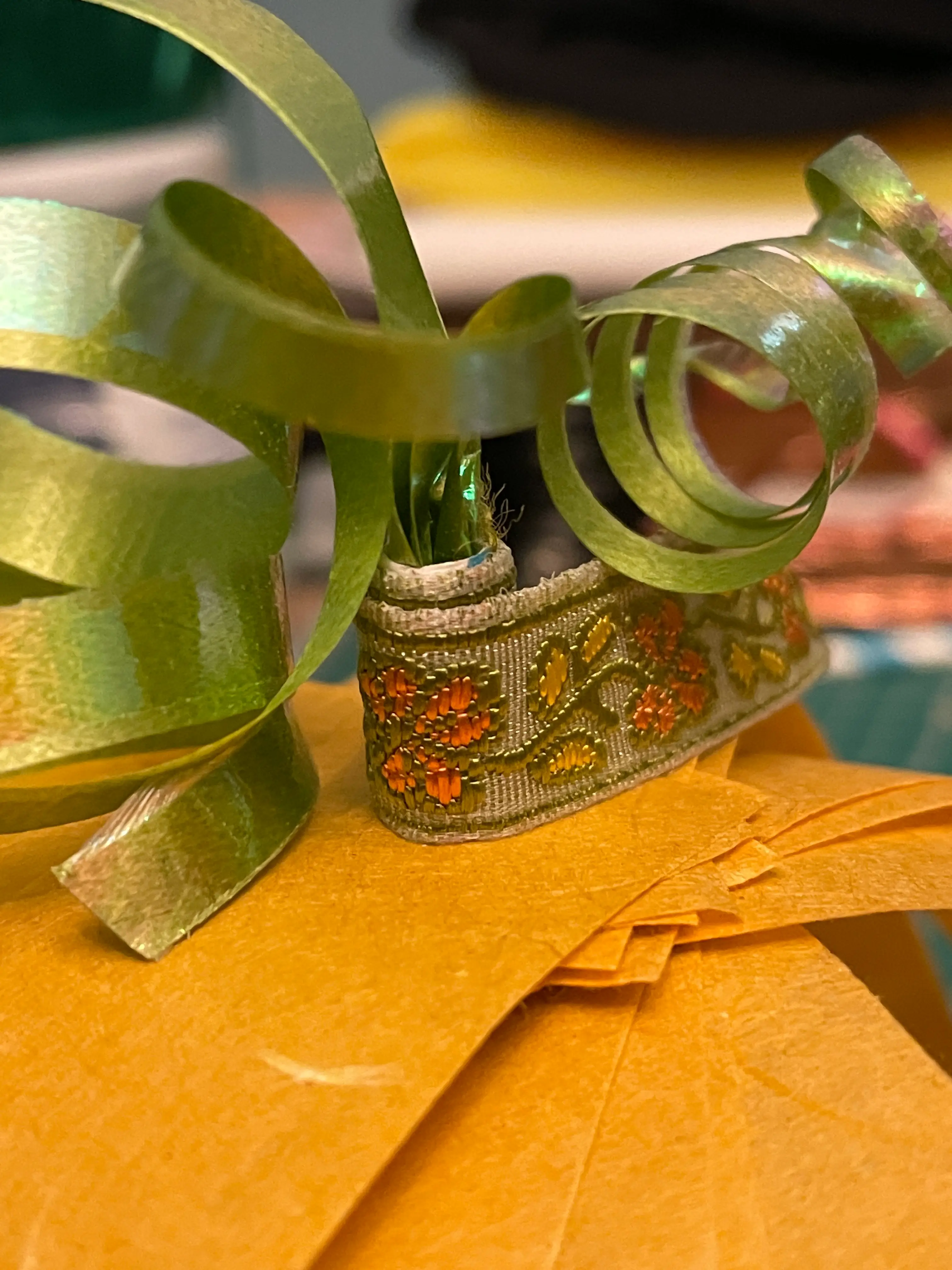 a close up of a paper pumpkin a close up of a paper pumpkin