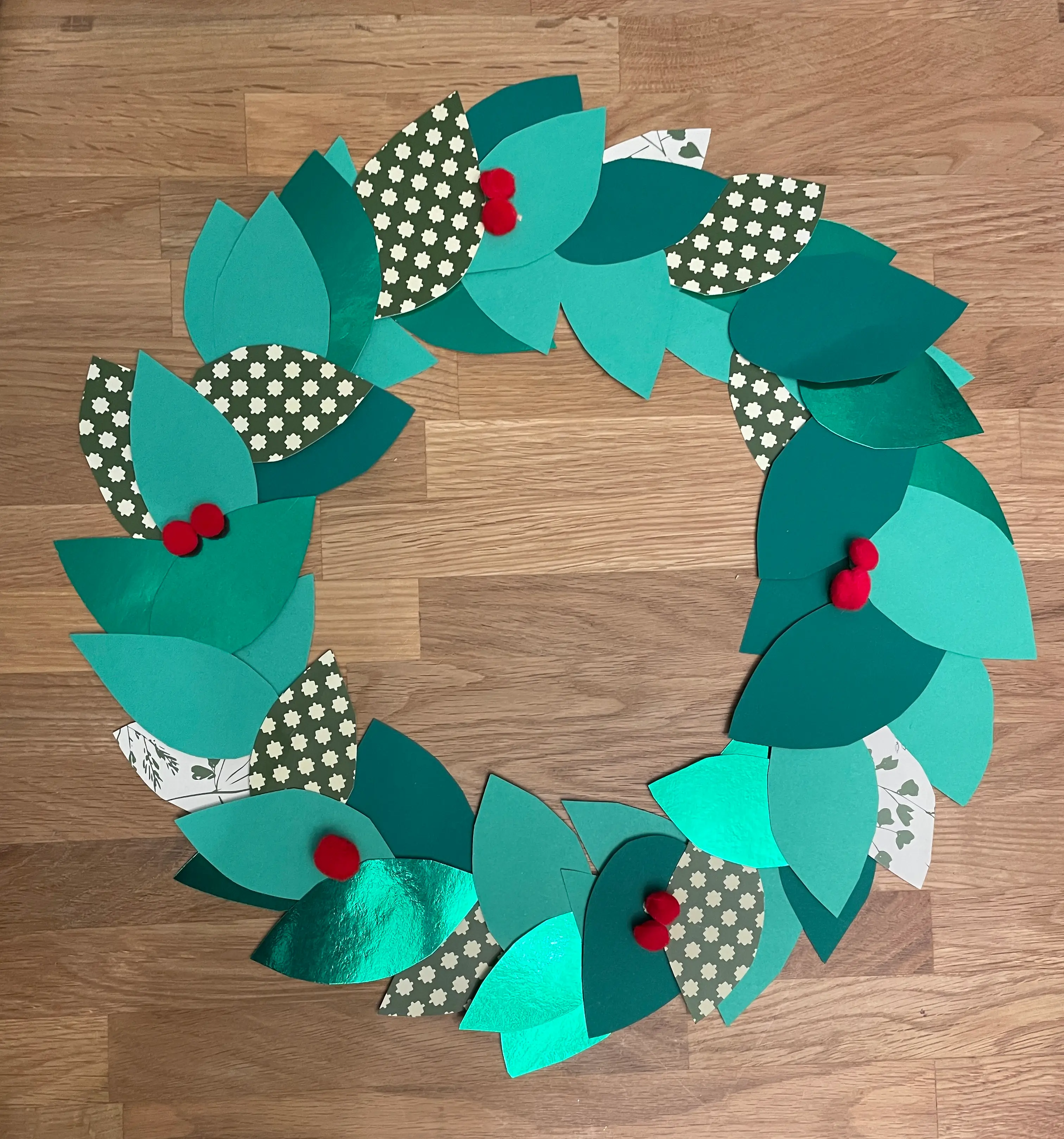a card and paper Christmas wreath a card and paper Christmas wreath