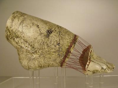 Ceramic Foot Showing Stitching