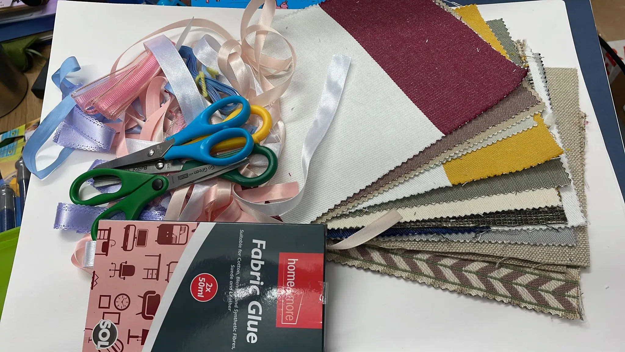 everything needed to make fabric covered notebooks gathered together everything needed to make fabric covered notebooks gathered together