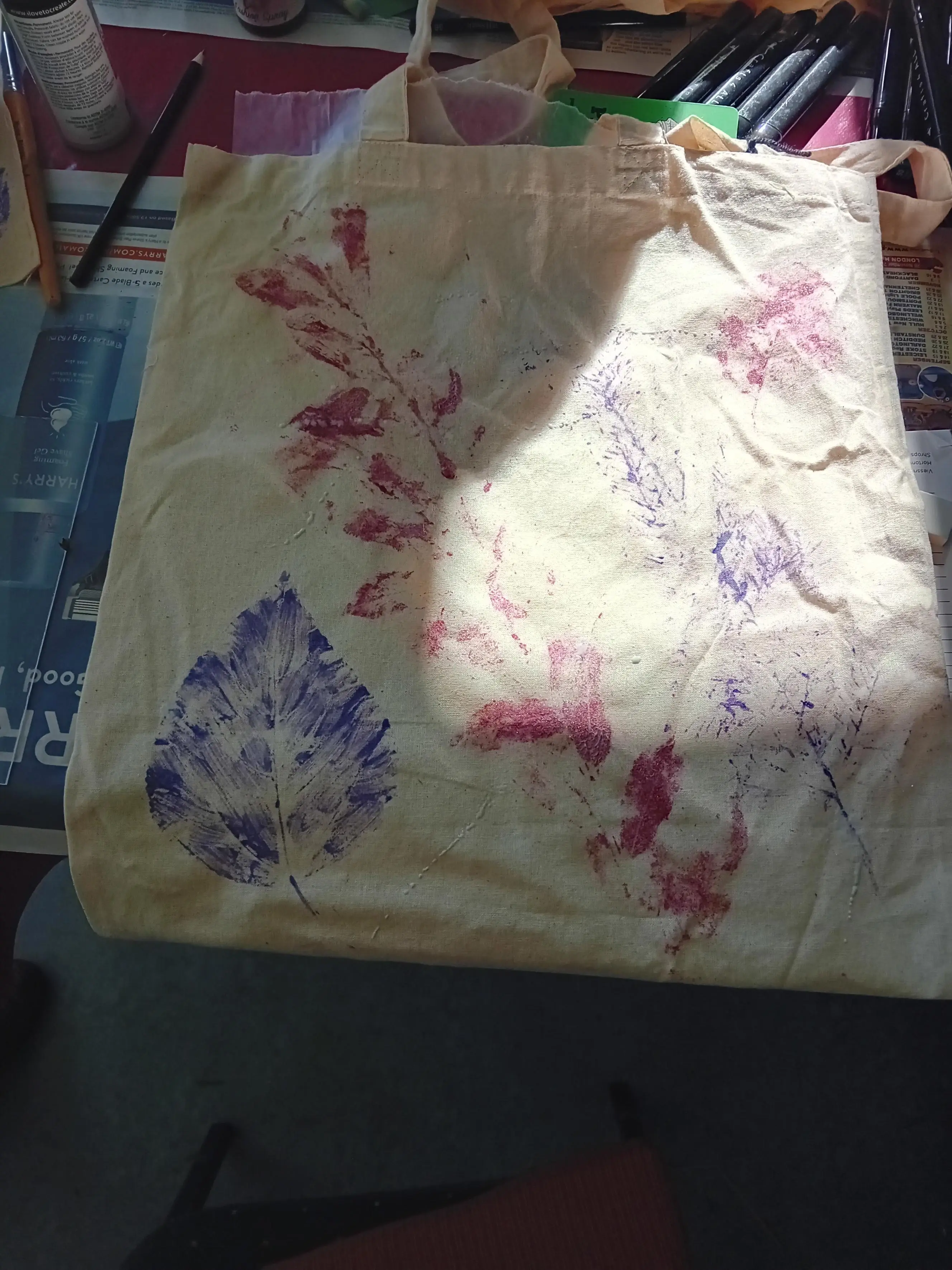 pink and purple leaf prints on a tote bag