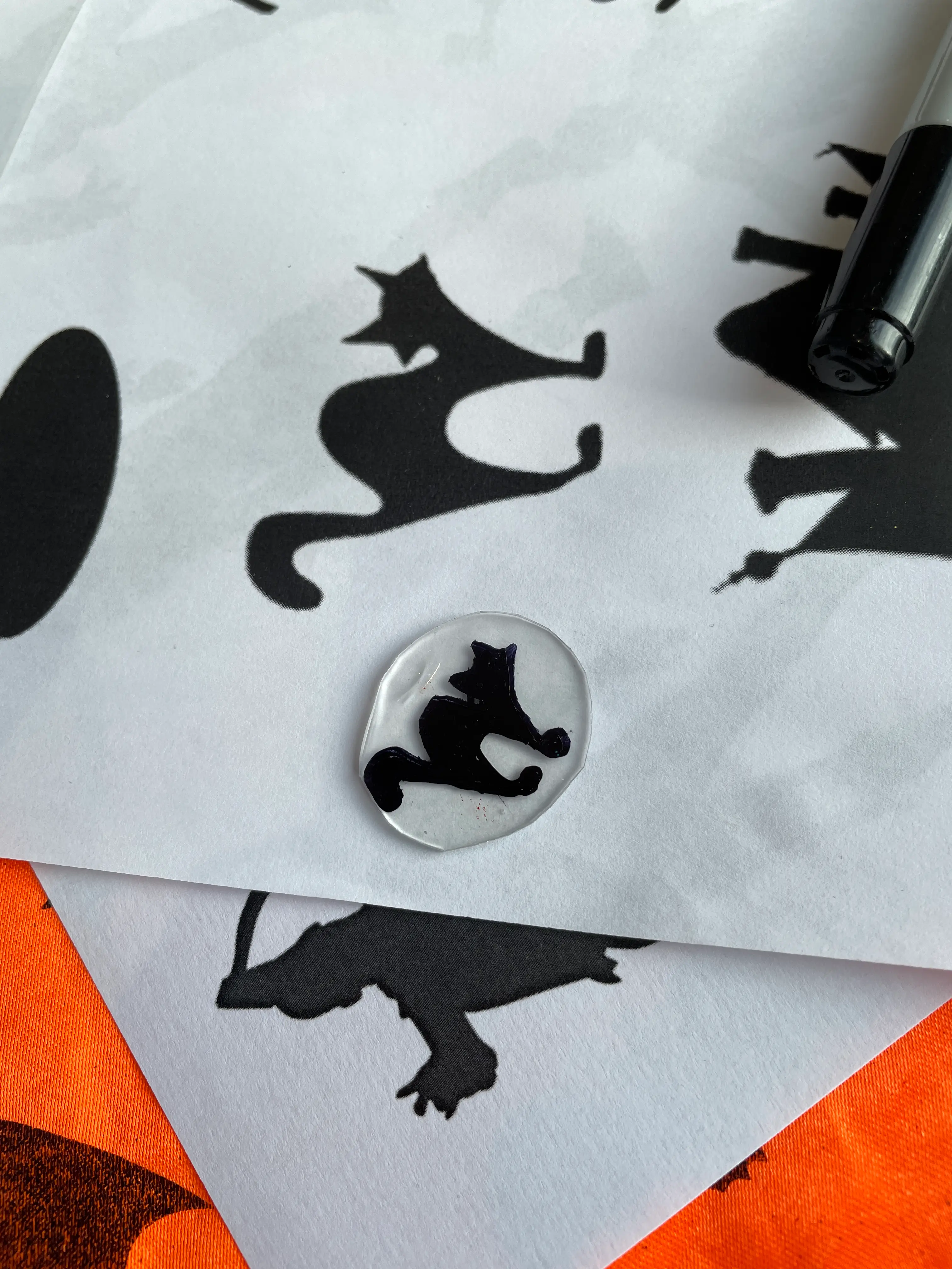 a spooky black cat image and a tiny shrunken version a spooky black cat image and a tiny shrunken version