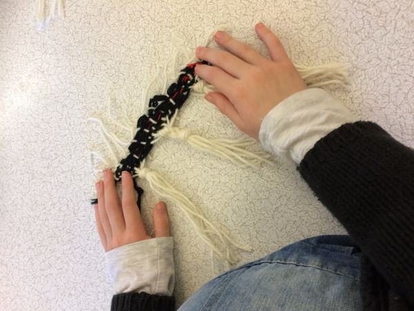 Introducing 10 year old to weaving 10 year old's first go at weaving